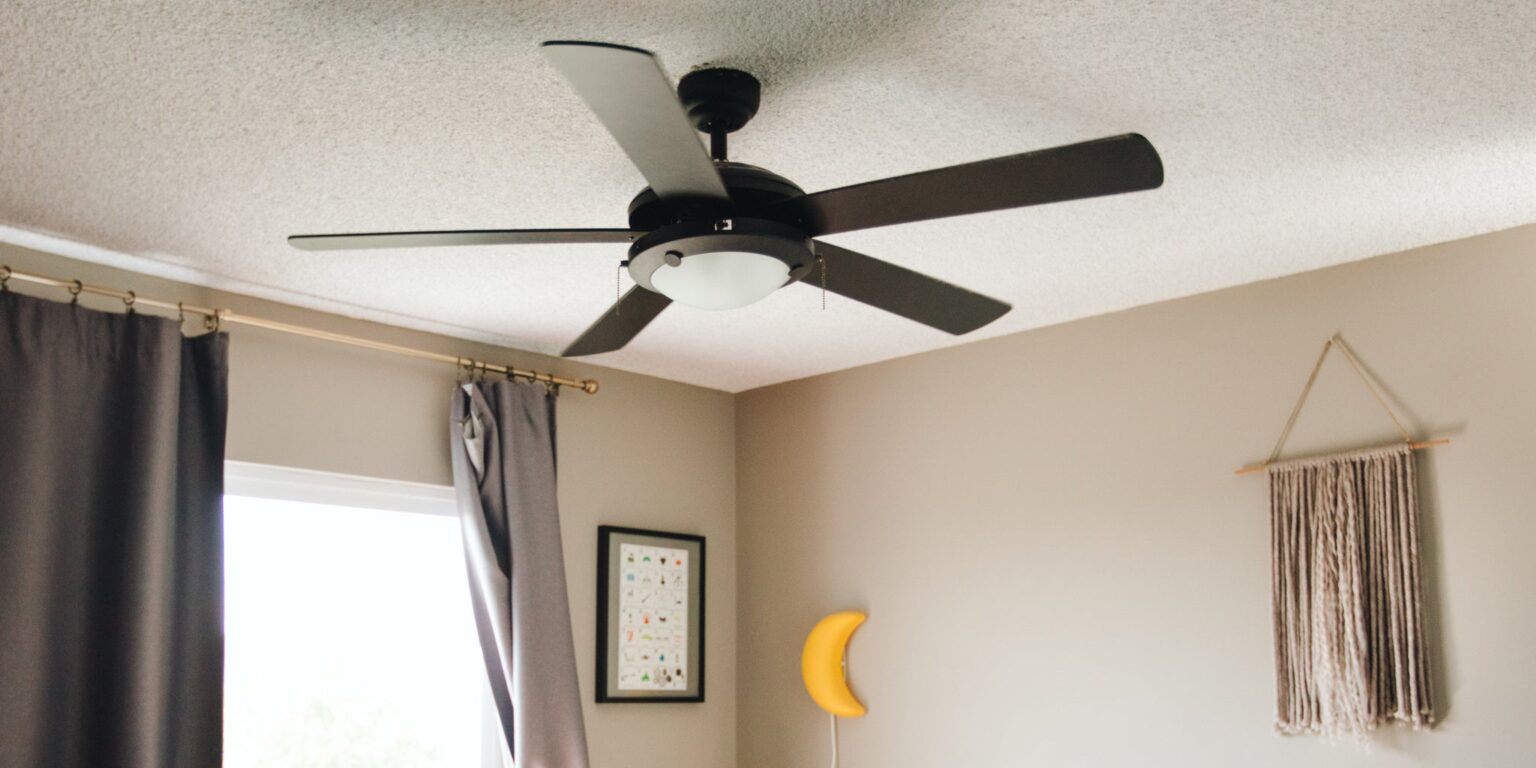 View of Living Room Ceiling Fan Installation: Cost, DIY & Electrician Tips
